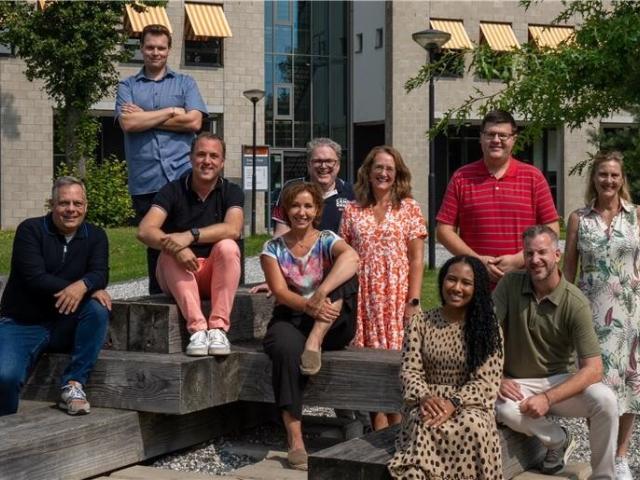Photo of all atpm team members outside the BUas building